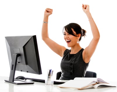 Successful business woman with arms up - isolated over a white background